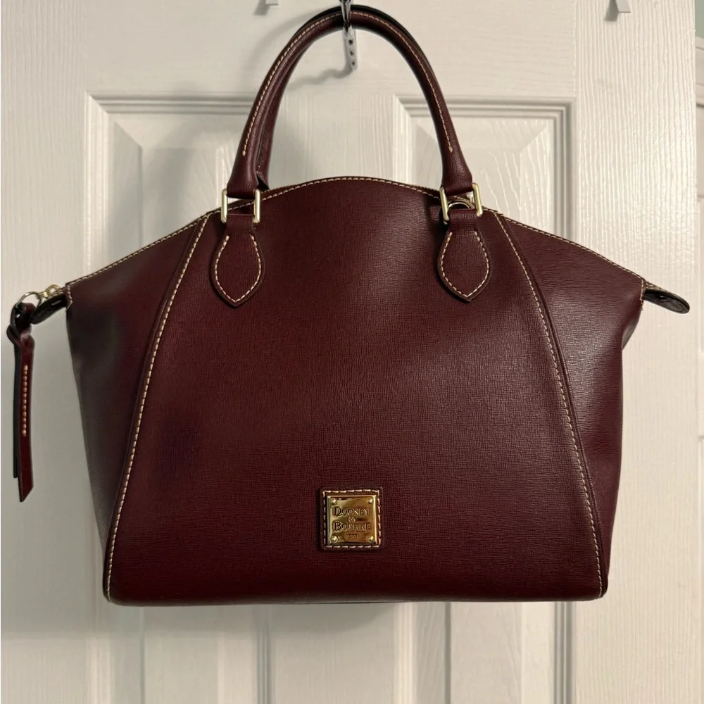 Dooney & Bourke reposhing this
